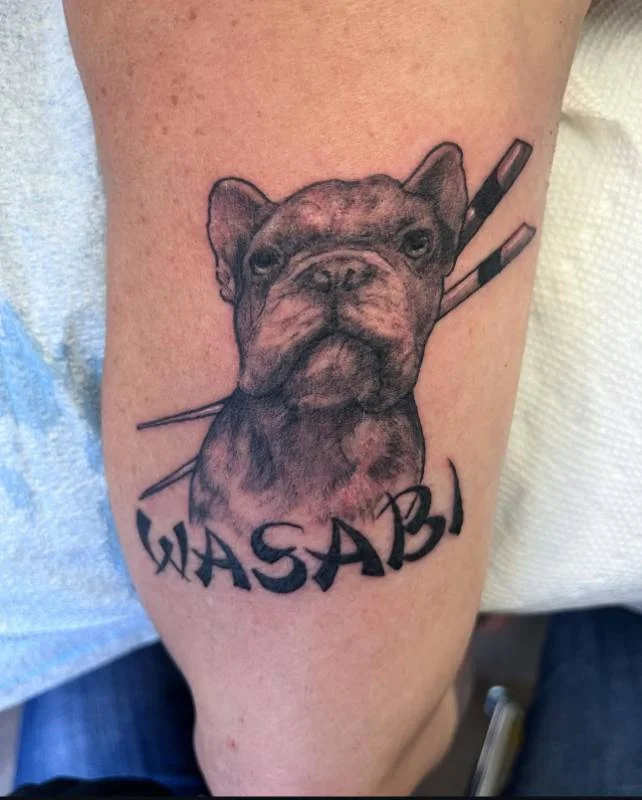 Heather Baldwin realism bulldog portrait tattoo on upper arm, Hawaii